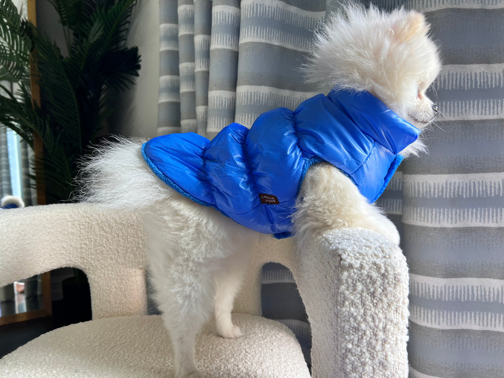 side profile of blue aspen puffer vest